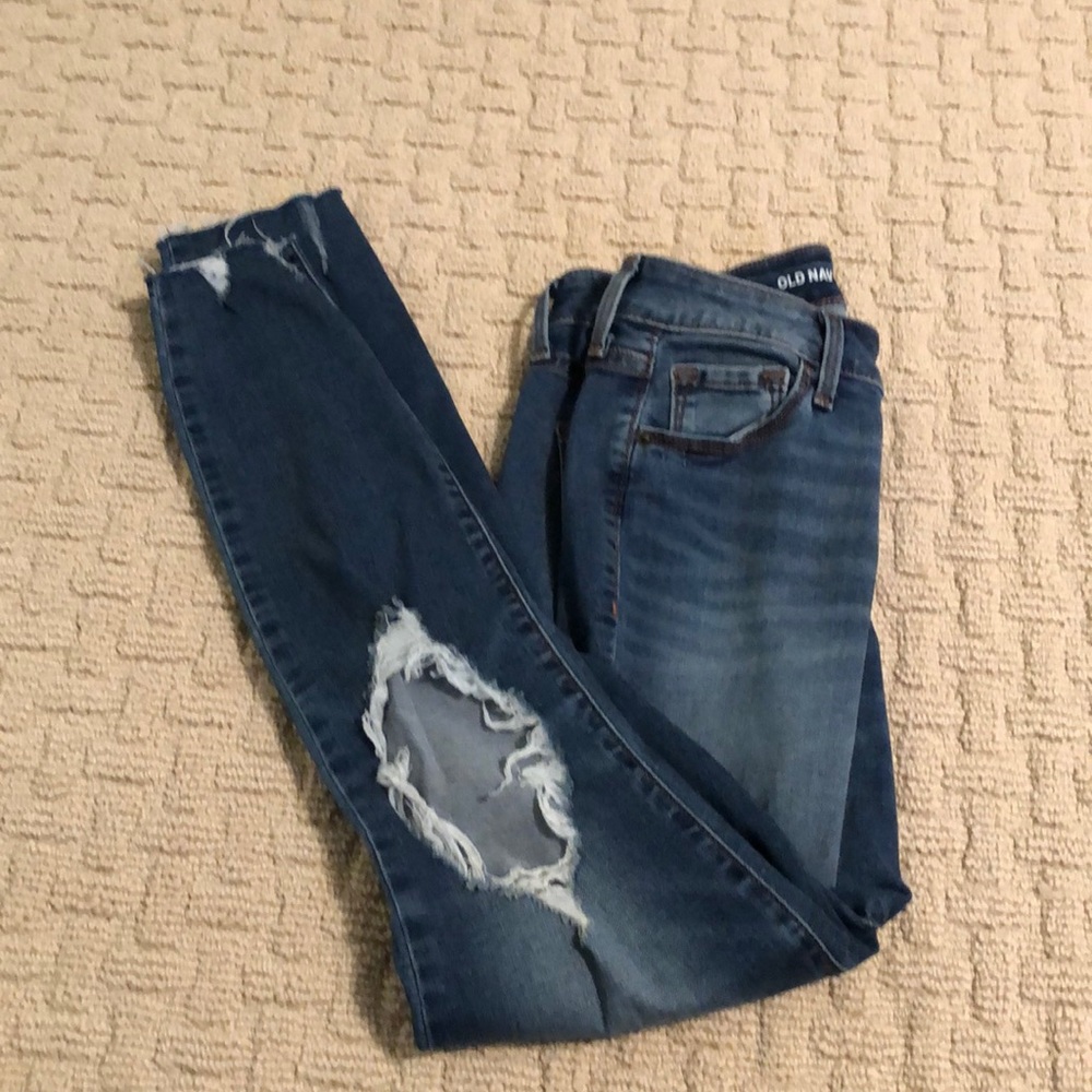old navy blue jeans with distressing on the knees